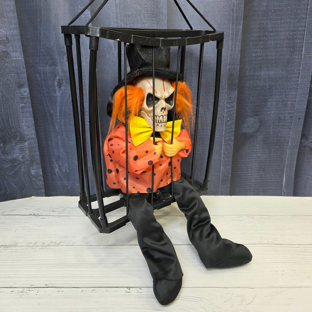 Animated Hanging Skeleton Cage – Evil Jester