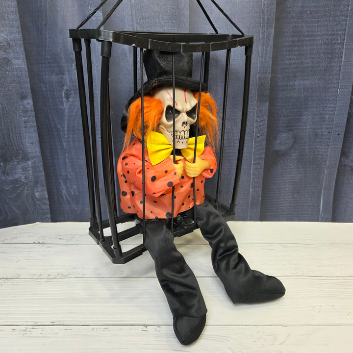 Animated Hanging Skeleton Cage – Evil Jester