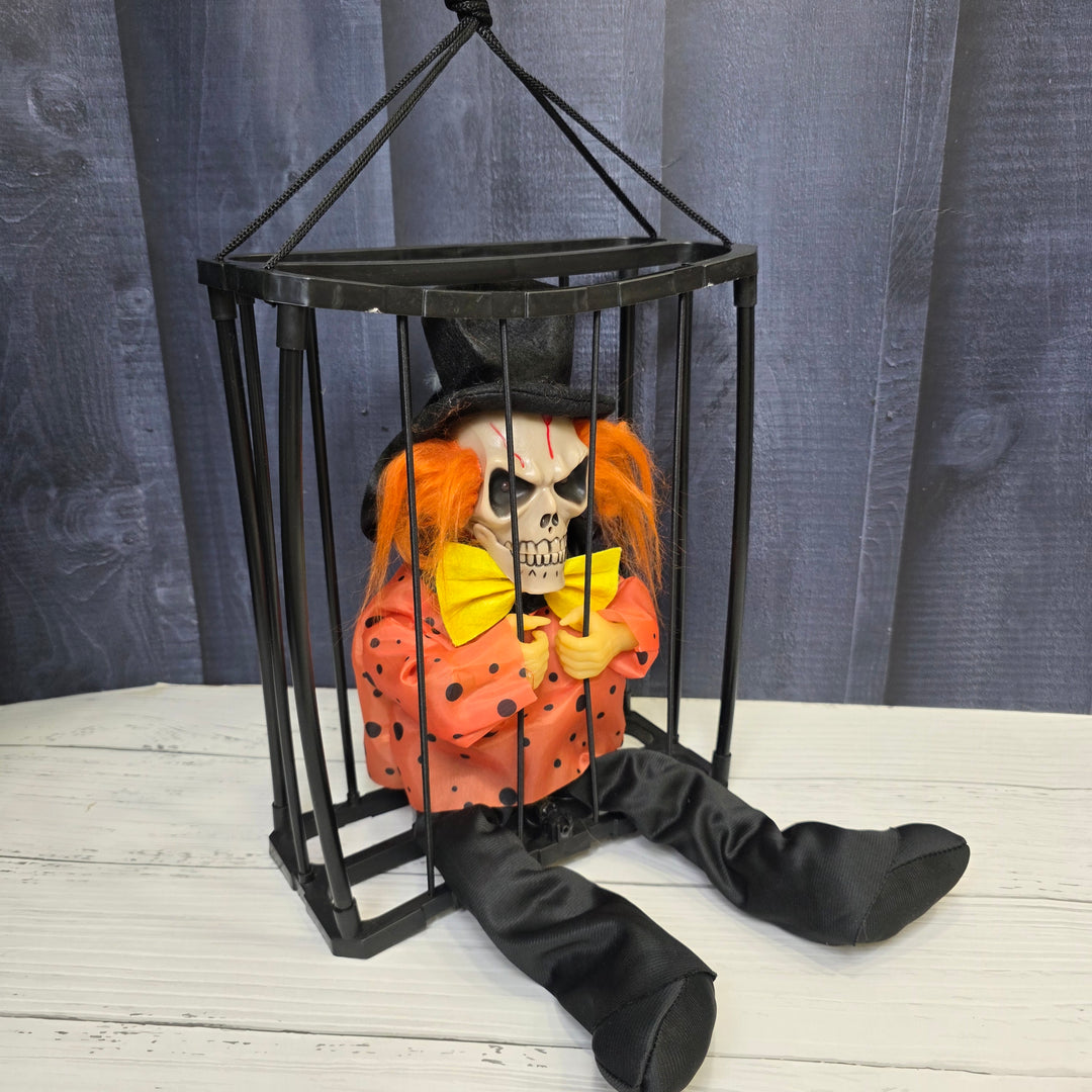 Animated Hanging Skeleton Cage – Evil Jester