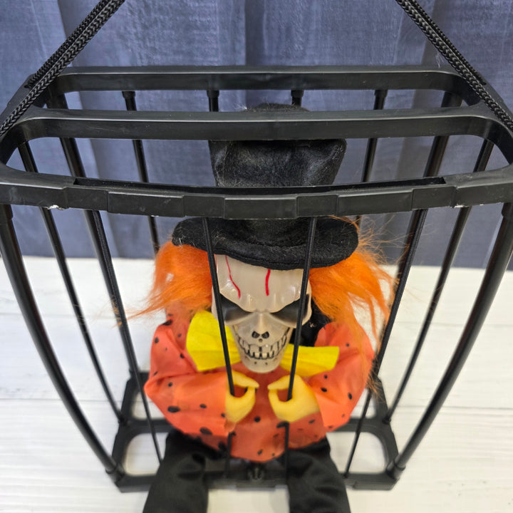 Animated Hanging Skeleton Cage – Evil Jester