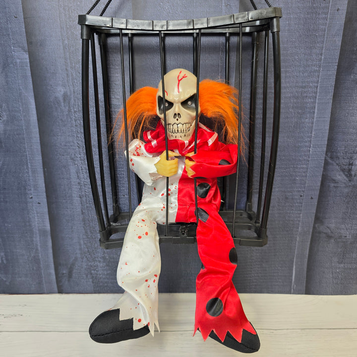 Animated Hanging Skeleton Cage – Bloody Clown