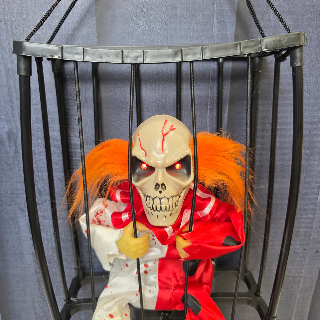 Animated Hanging Skeleton Cage – Bloody Clown