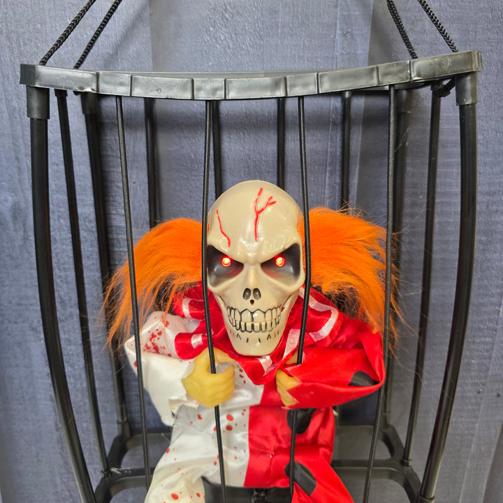 Animated Hanging Skeleton Cage – Bloody Clown