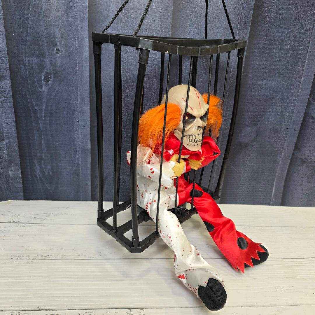 Animated Hanging Skeleton Cage – Bloody Clown