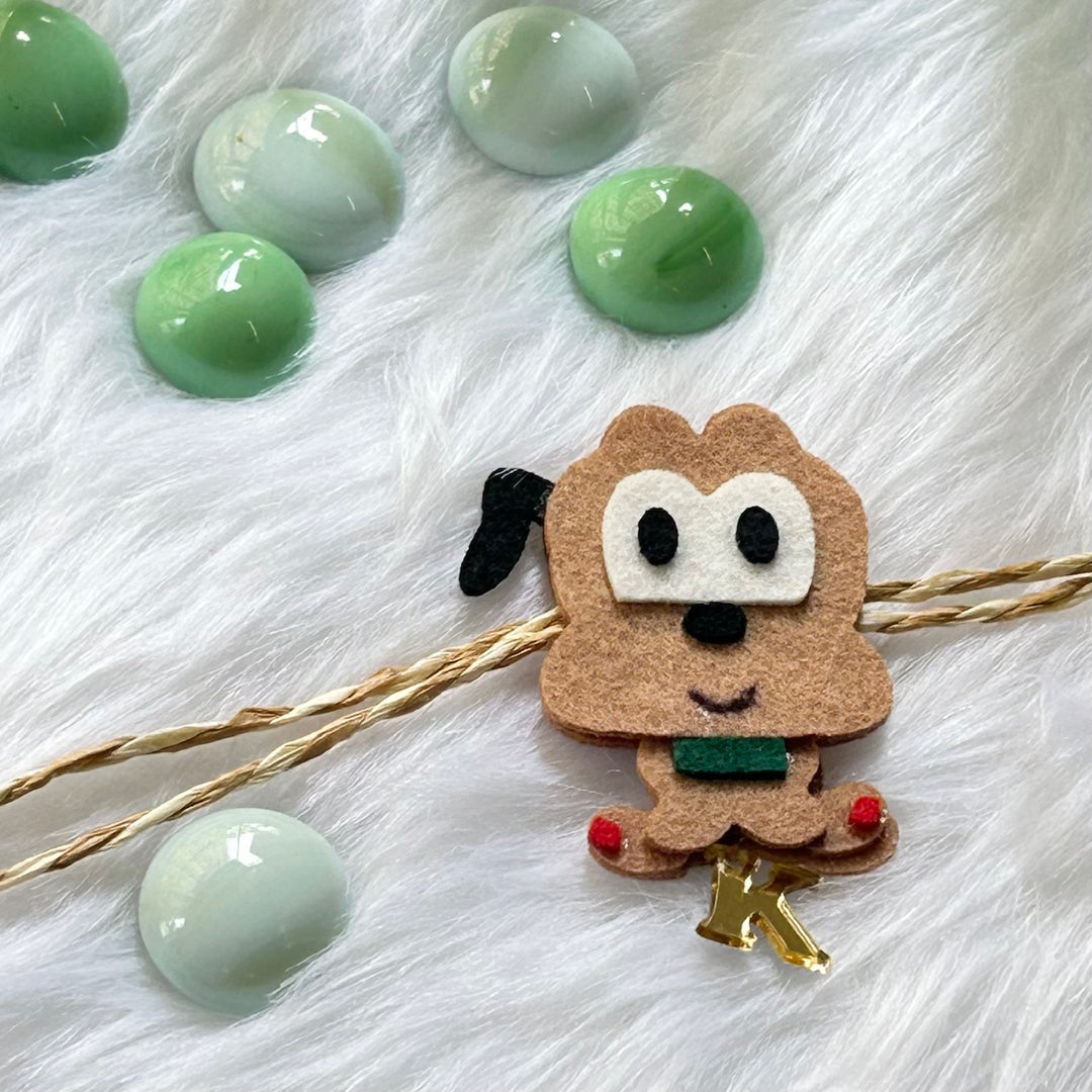 Babble Wrap Handmade Felt Rakhi With Initials - Pluto