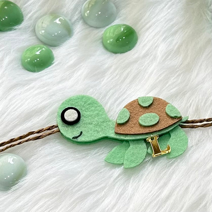 Babble Wrap Handmade Felt Rakhi With Initials - Turtle Tie