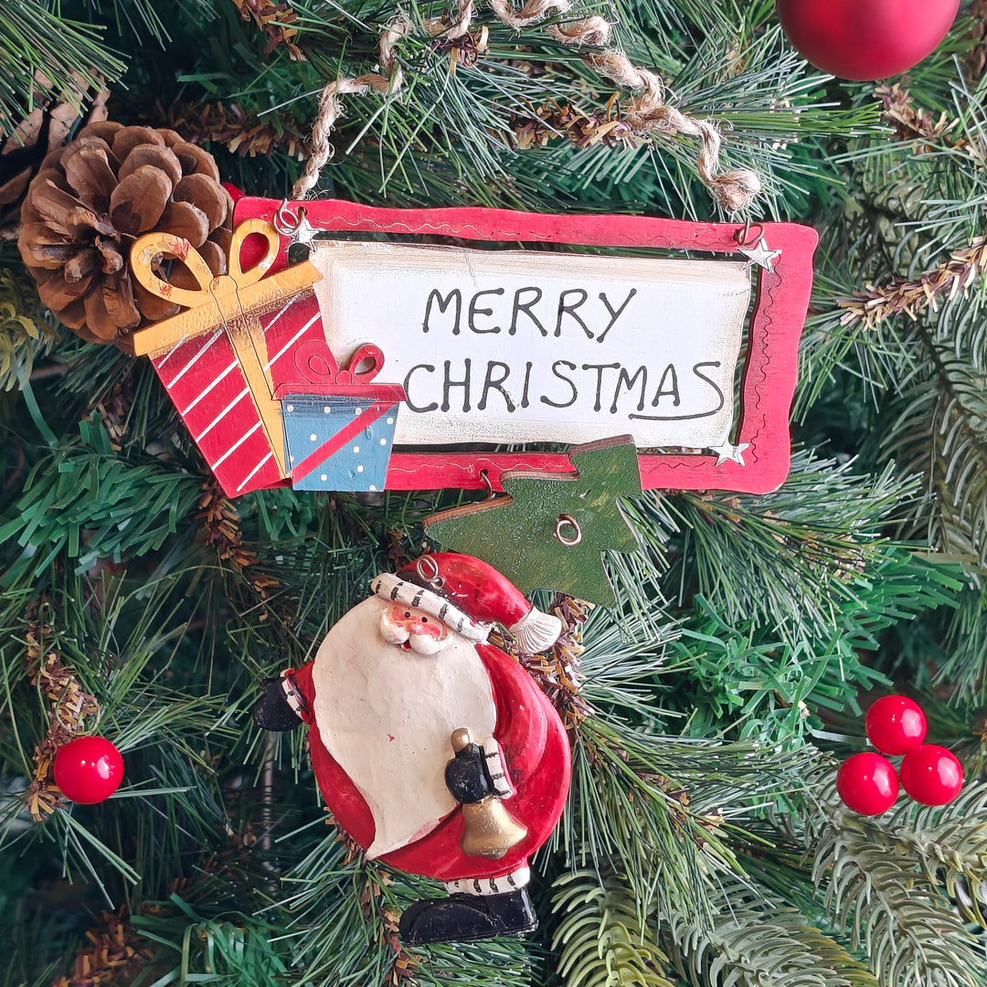 Santa with a Bell Ornament