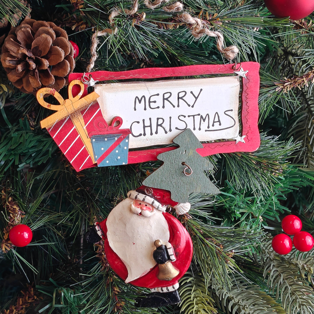 Santa with a Bell Ornament