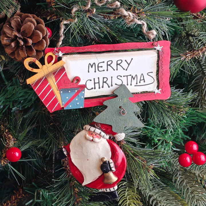 Santa with a Bell Ornament