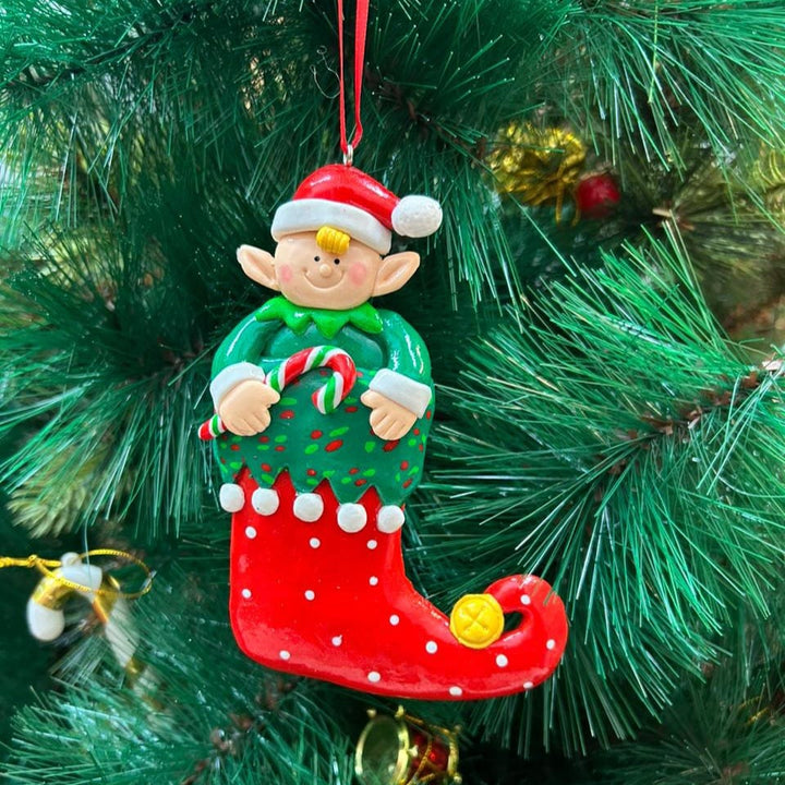 Babble Wrap Elf with a Candy Cane Ornament