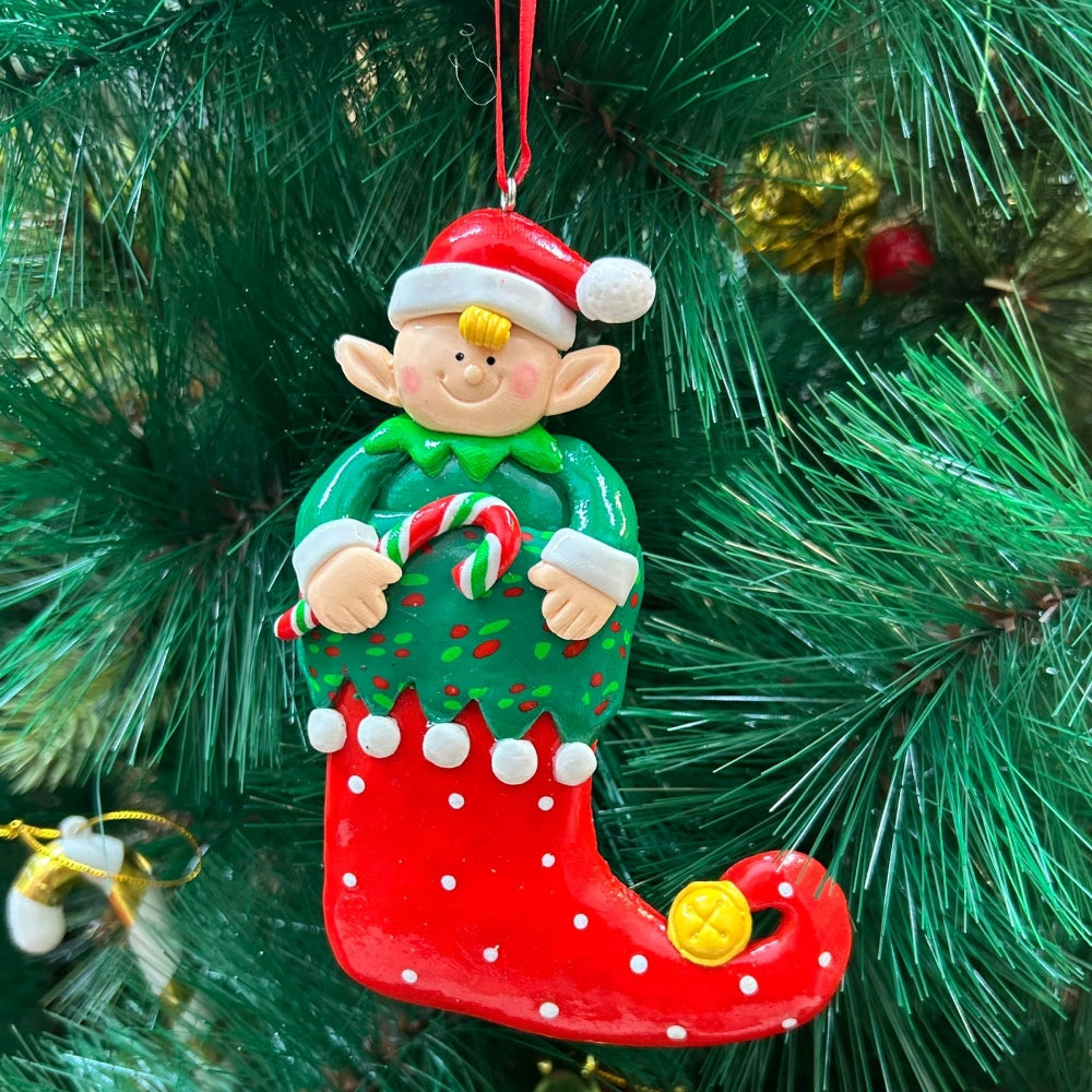 Babble Wrap Elf with a Candy Cane Ornament