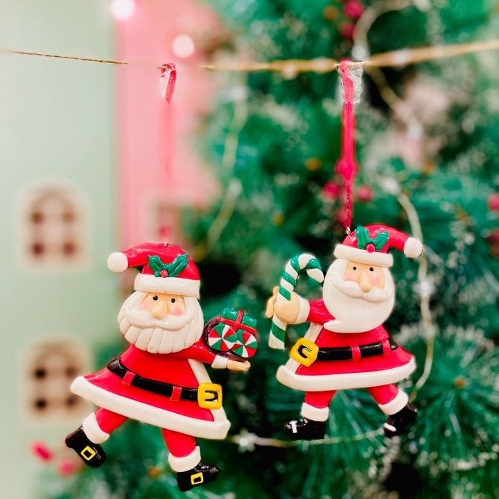 Dancing Santa With A Candy Ornament