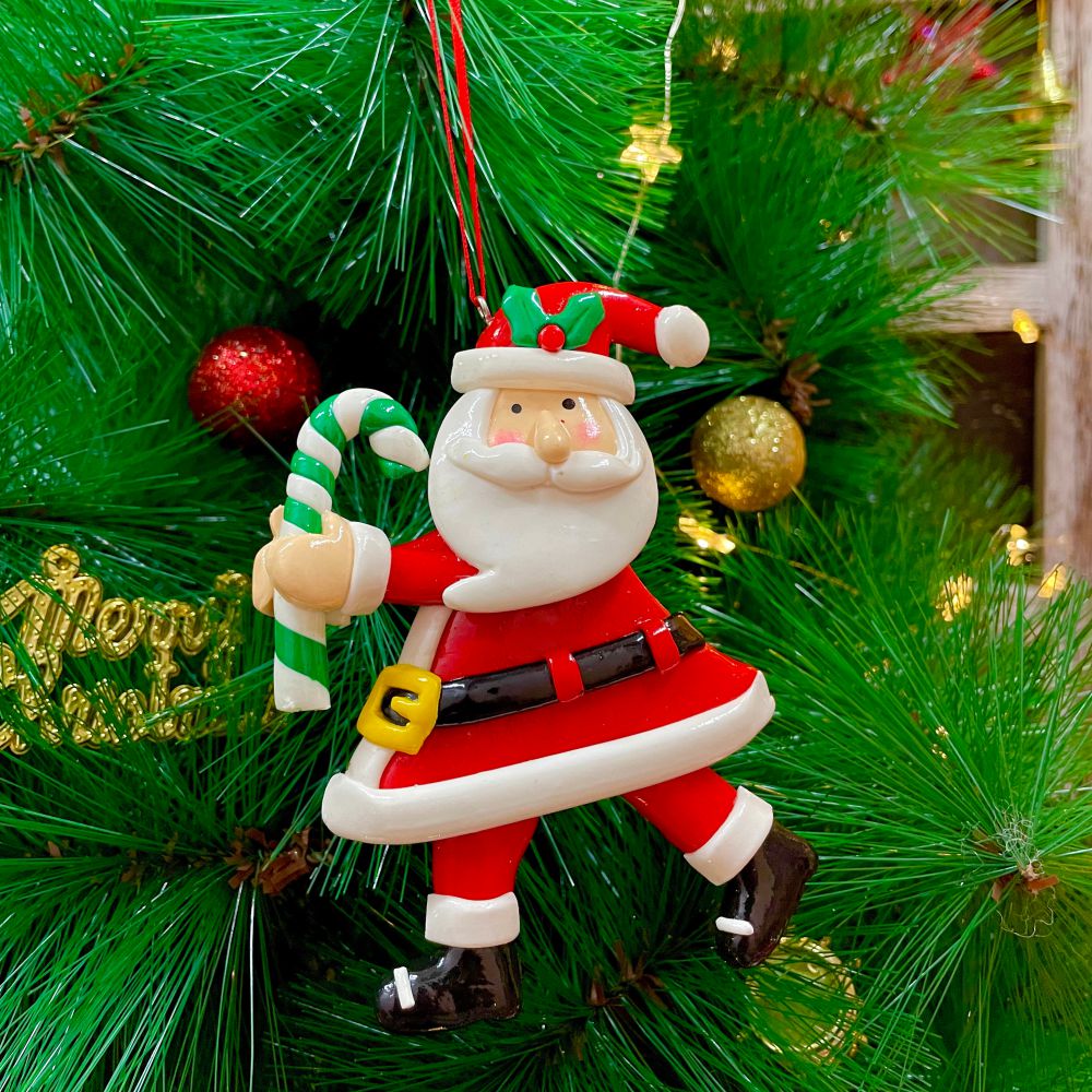 Dancing Santa With A Candy Ornament