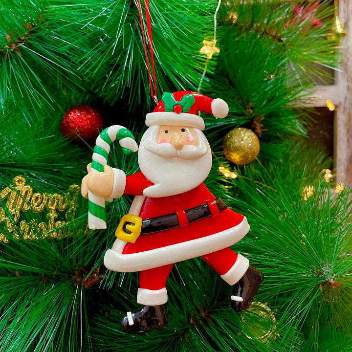 Dancing Santa With A Candy Ornament